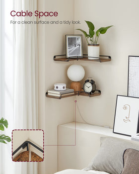 VASAGLE bedroom shelf displaying photo frames and small items.