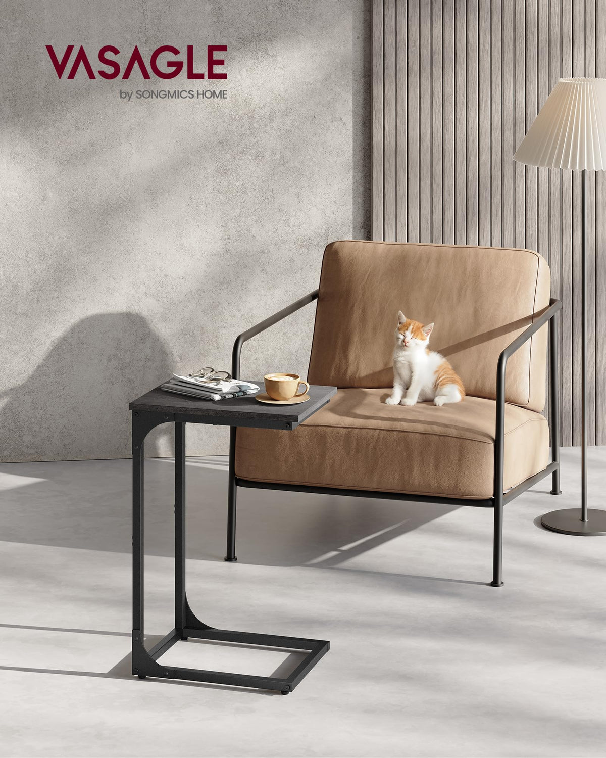 VASAGLE C-Shaped End Table side view hugging a sofa for easy reach.