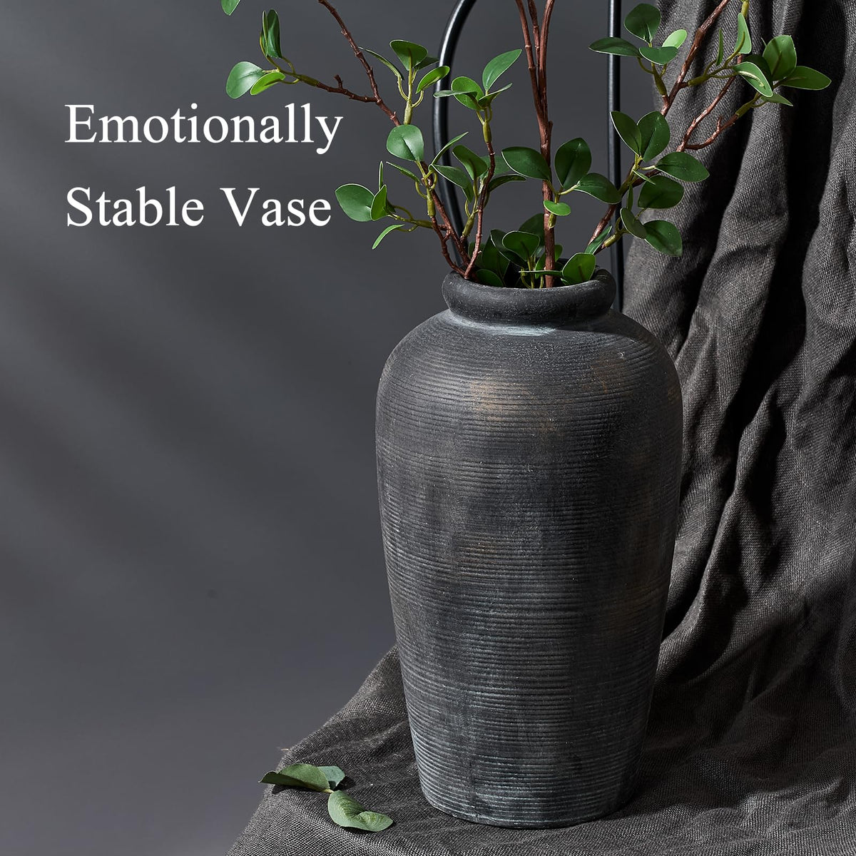 Vaseking terracotta vase supports fresh or dried arrangements as a centerpiece
