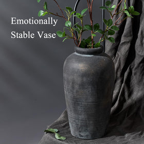 Vaseking terracotta vase supports fresh or dried arrangements as a centerpiece
