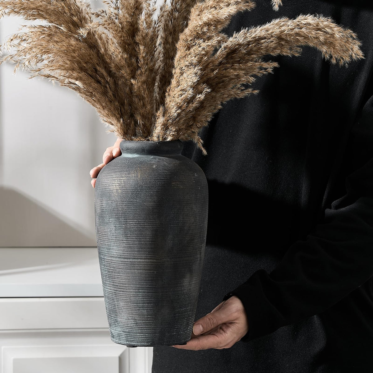 Vaseking warm rustic vase stands as a decorative focal point in any room