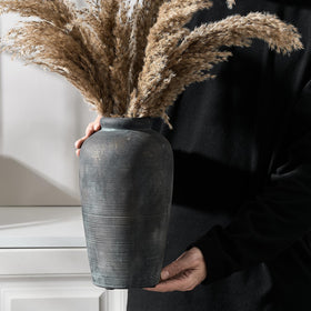 Vaseking warm rustic vase stands as a decorative focal point in any room