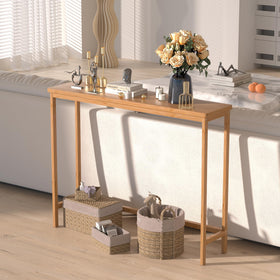 VASMIA Console Table in living room setup with vase and books.
