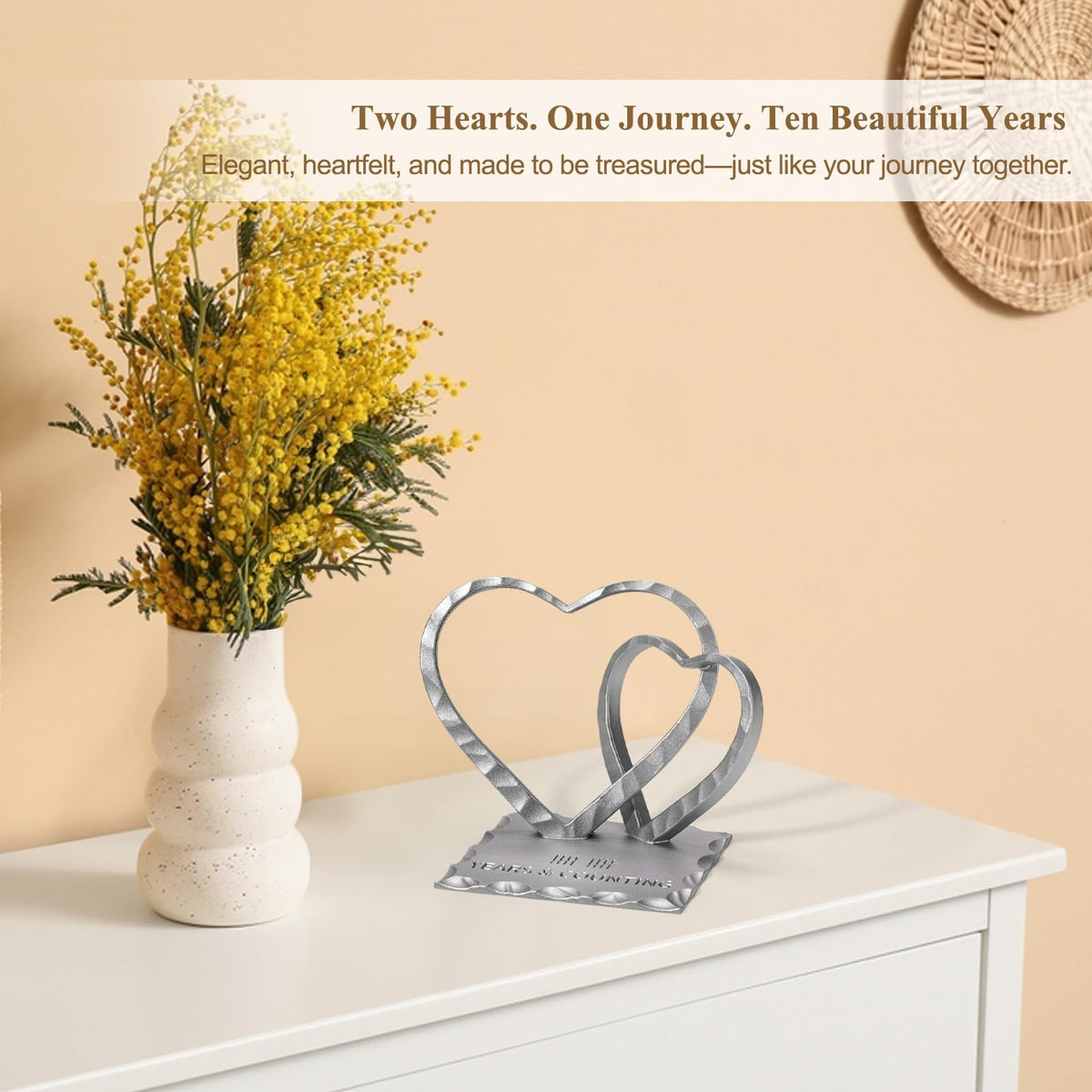 Vastsea heart sculpture on bedside table adds warm ambiance.