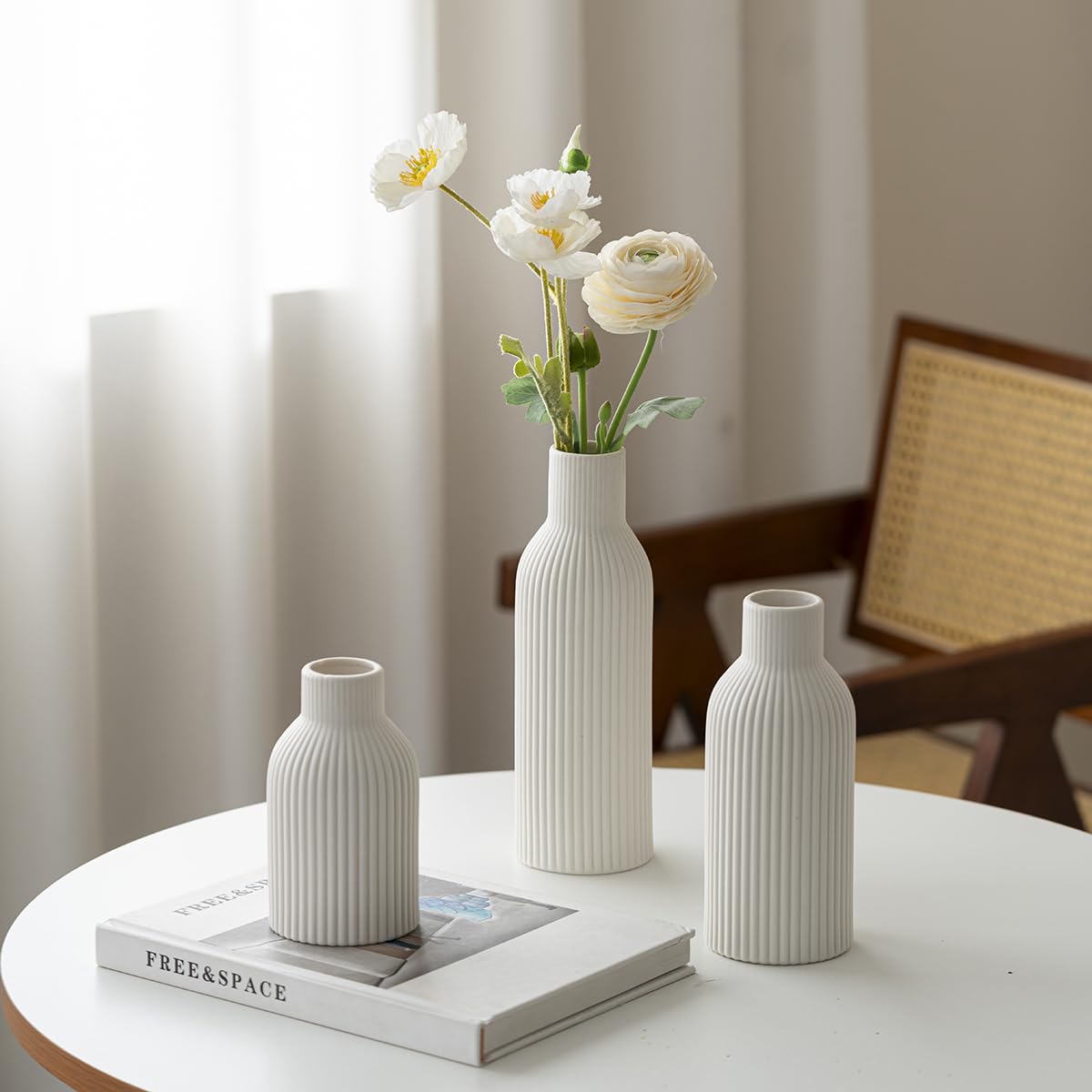 VAURCESA 8-inch white ribbed vase suits compact floral arrangements.