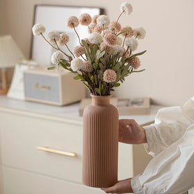 Vaurcesa ribbed matte terra vase adds tactile charm to mantels