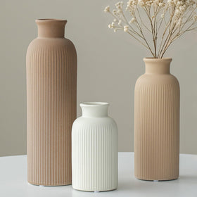 Vaurcesa decorative vase stand-alone 3-piece set adds sculptural interest.