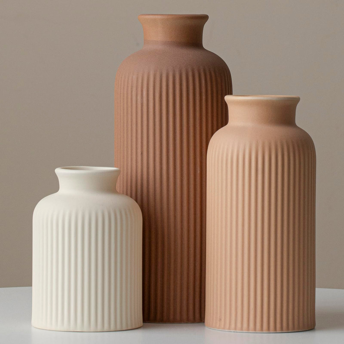 Vaurcesa cream large modern ceramic vase set adds a refined centerpiece for coffee-toned spaces
