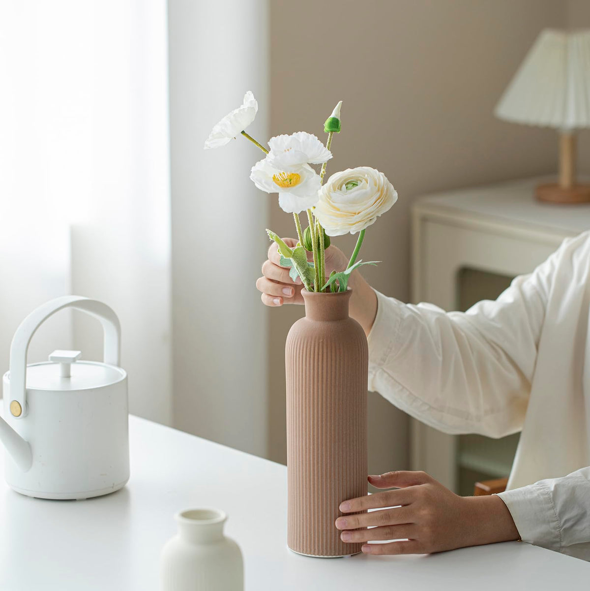 Vaurcesa matte finish ceramic vase with earth tones suits contemporary spaces.