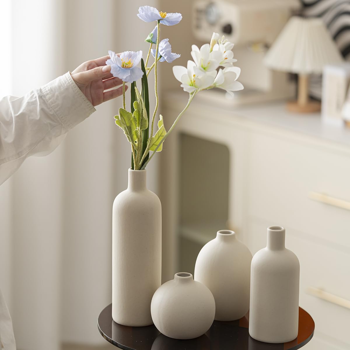 Vaurcesa beige dried-flowers display vase enhances decor.