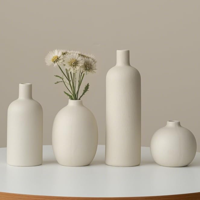 Vaurcesa sculptural-curve vase adds artistic focal point.