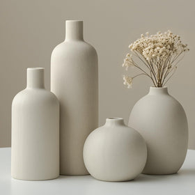 Vaurcesa tall beige ceramic vase from the set, perfect for a centerpiece.