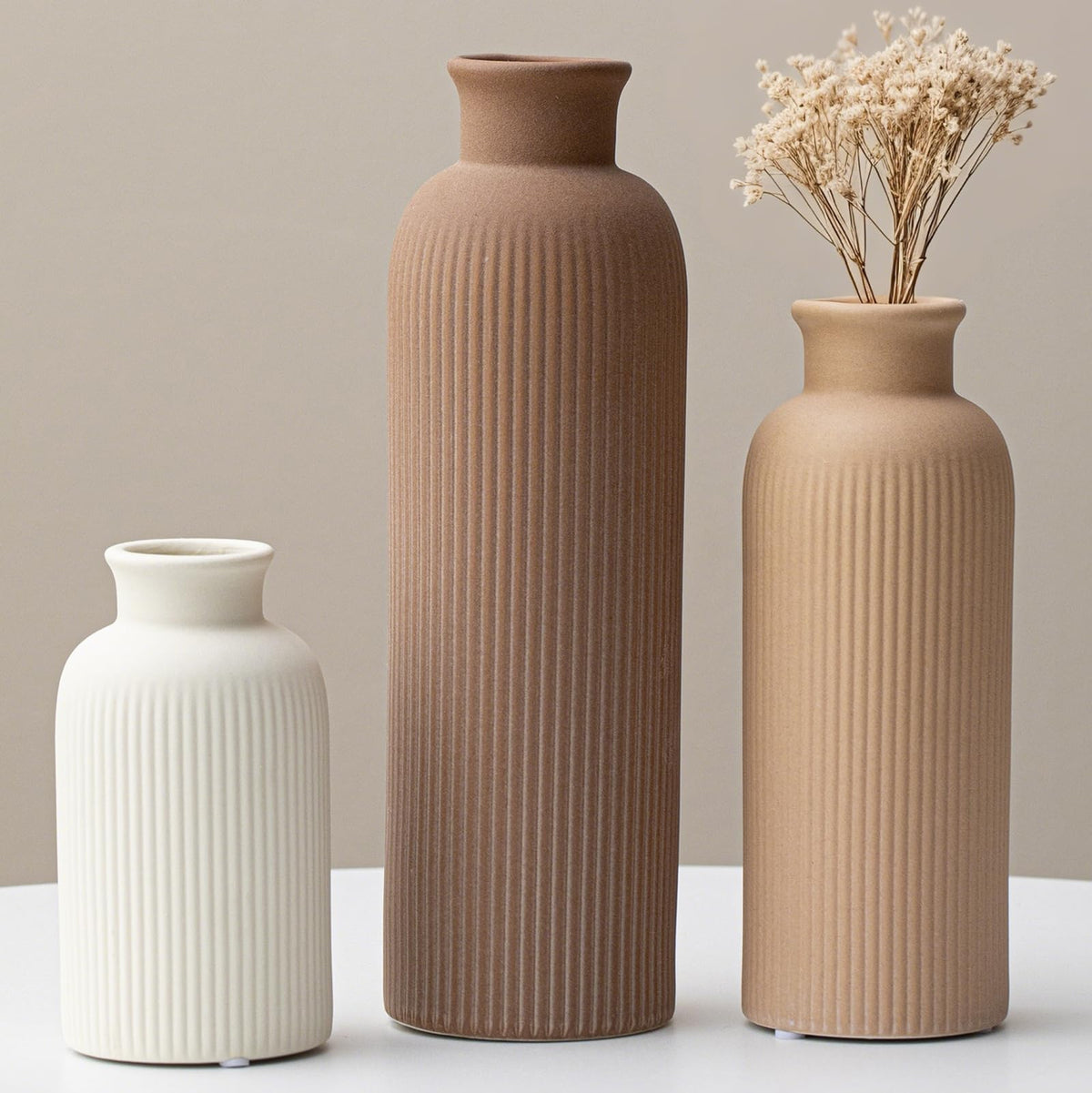 Vaurcesa modern ceramic vase set in coffee tones, ideal for fresh flowers.
