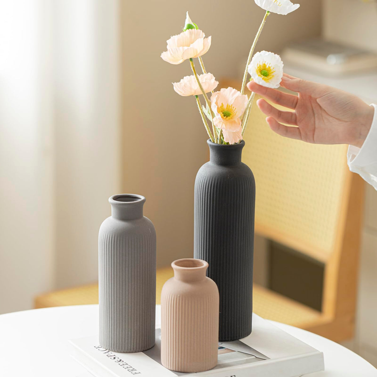 vaurcesa ribbed vase trio shown on console for modern accent