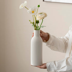 VAURCESA office decor white ribbed vase adds subtle sophistication.