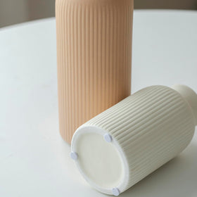 Vaurcesa ribbed texture vases provide versatile display on desks and mantels.
