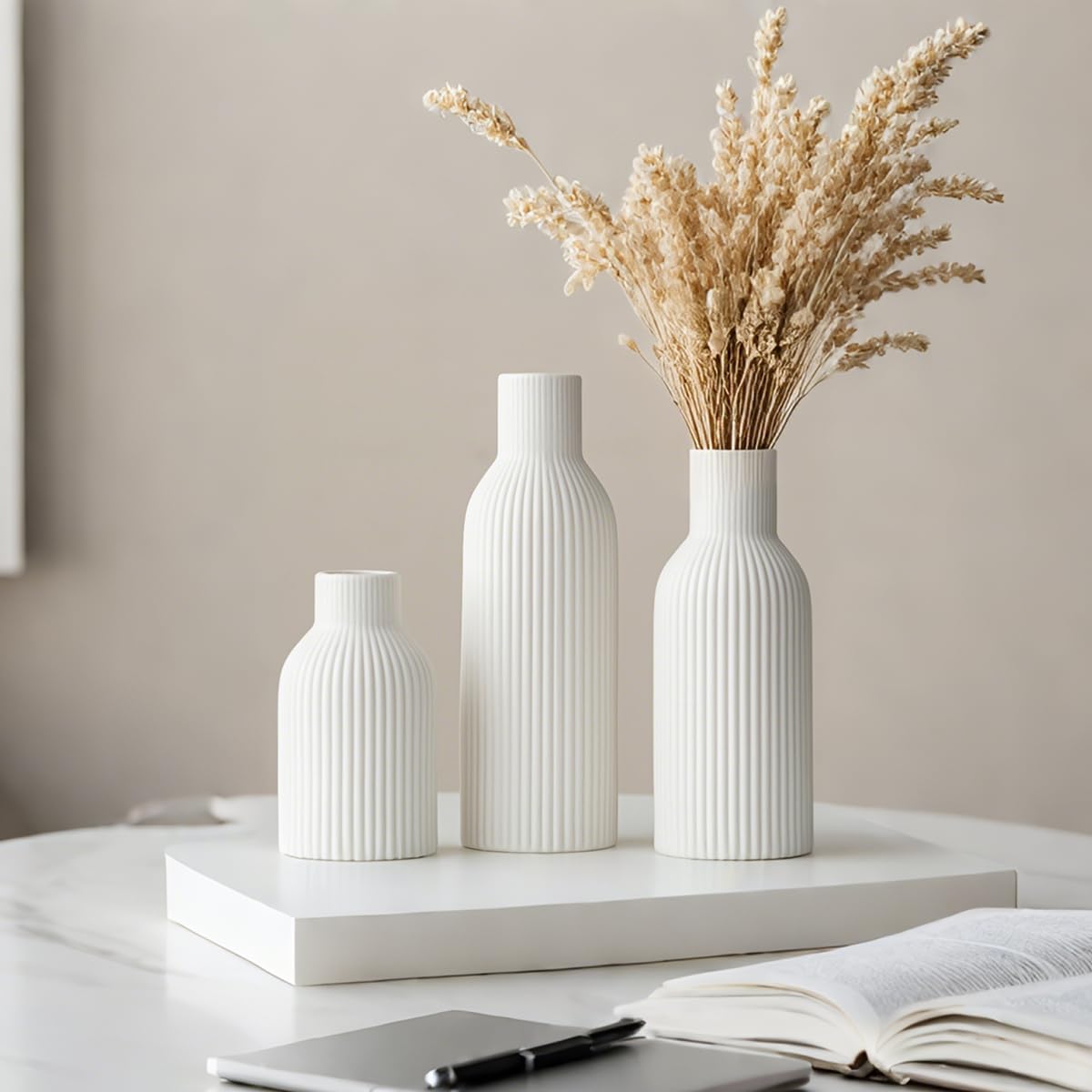 VAURCESA white ribbed vase on shelf enhances minimalist decor.