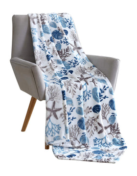 VCNY Home coastal seashell pattern blanket adds coastal charm to living spaces
