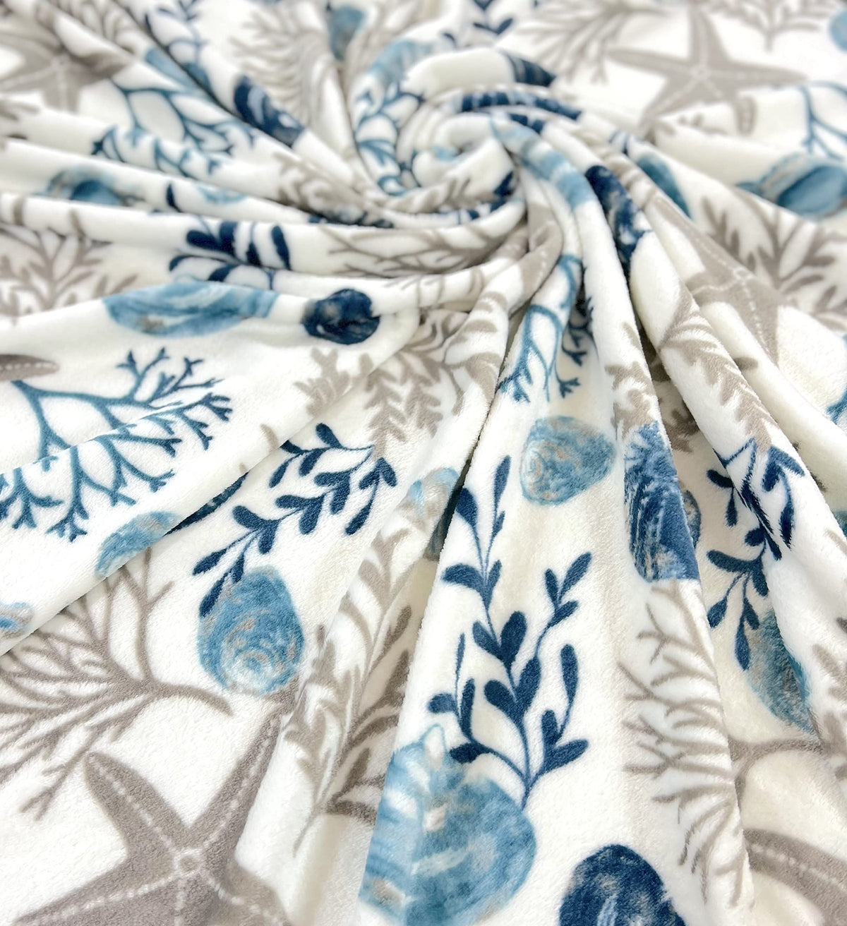VCNY Home 50x70 inch blanket provides generous coverage for lounging