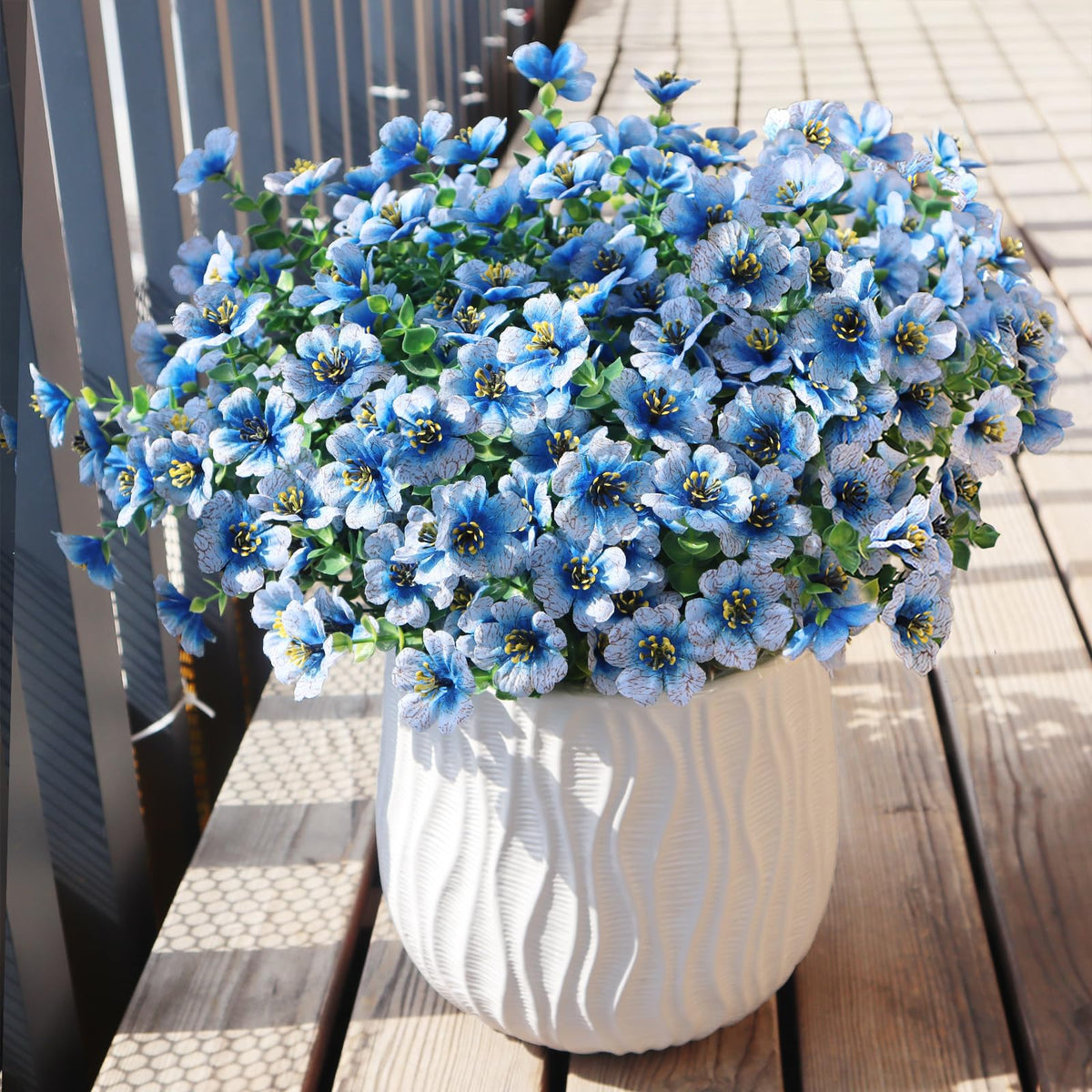 Durable, fade resistant outdoor flowers built to withstand seasonal weather.