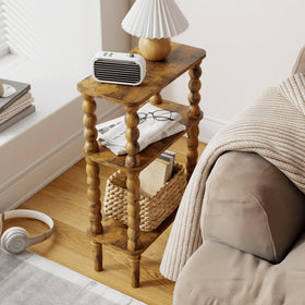Veegle side table with 3-tier storage keeps remotes and books organized.