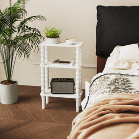 Veegle white side table adds a cozy accent to small spaces.