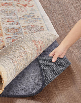 Veken non-slip rug pad 8x10 with cushioned grip prevents slipping.