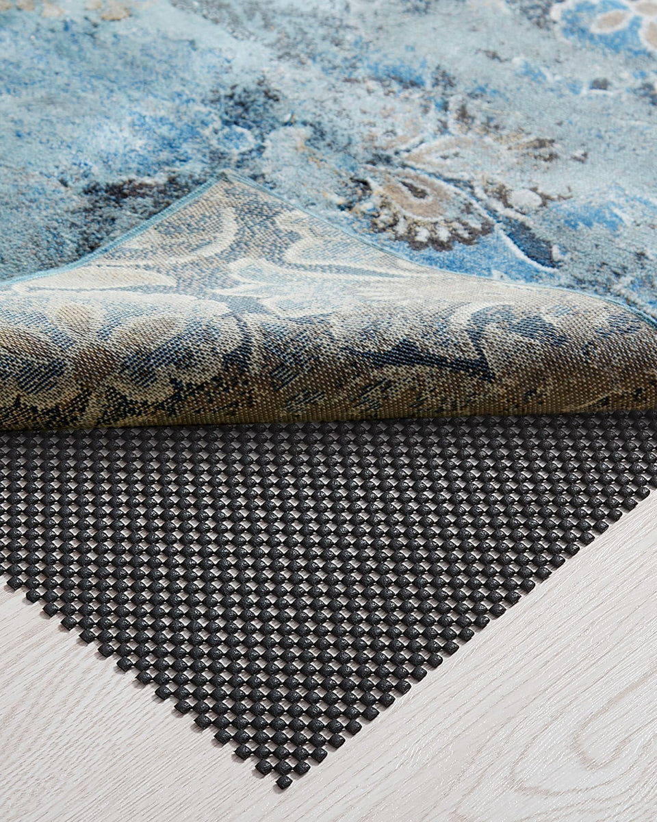 Veken Rug Pad Gripper 5x7ft securely holds area rugs in place, reducing bunching.