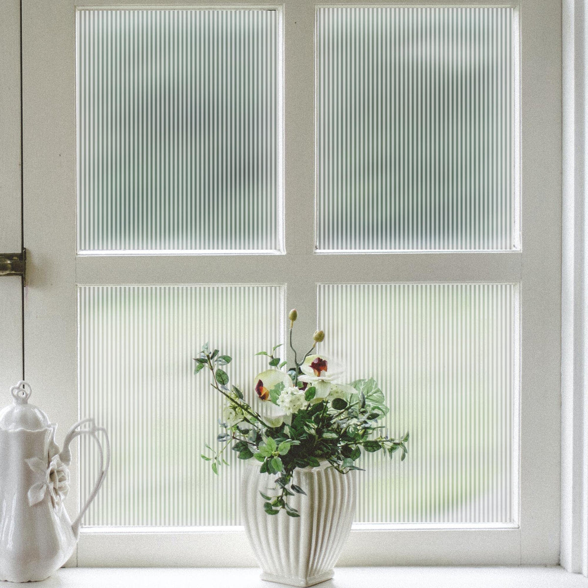 VELIMAX reeded glass window film applied to a door for privacy and style.