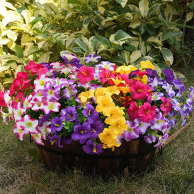 Vemander artificial flowers arranged in an outdoor planter for balcony charm.