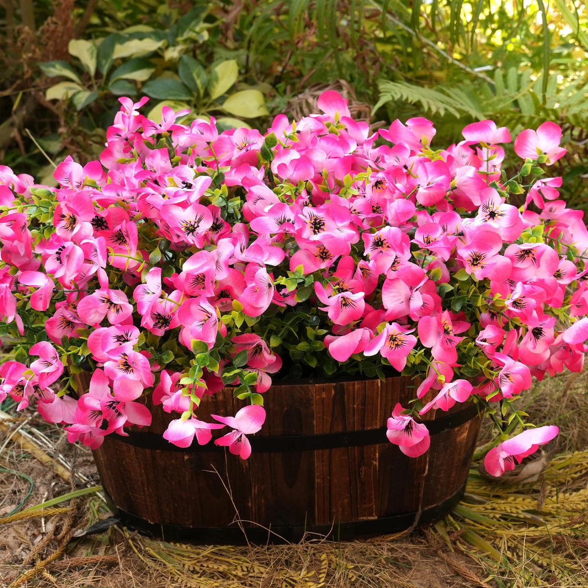 Vemander UV resistant pink pansies offer color that endures outdoors.