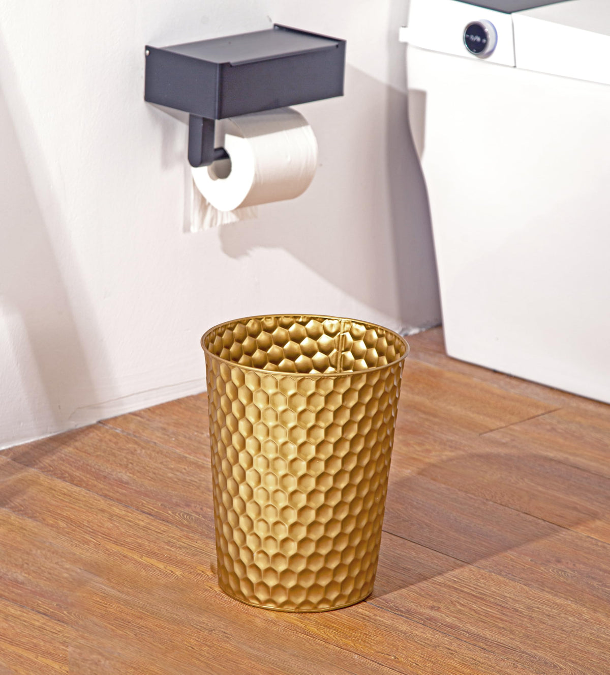 Venalys decorative bin doubles as planter for artificial greens.