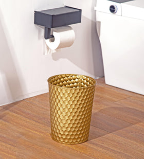 Venalys decorative bin doubles as planter for artificial greens.