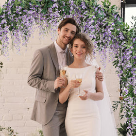 Veryhome wisteria garland on wedding arch for elegant focal point