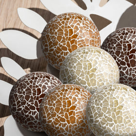 Vesici mosaic sphere ball decorative display elevates tables and shelves.