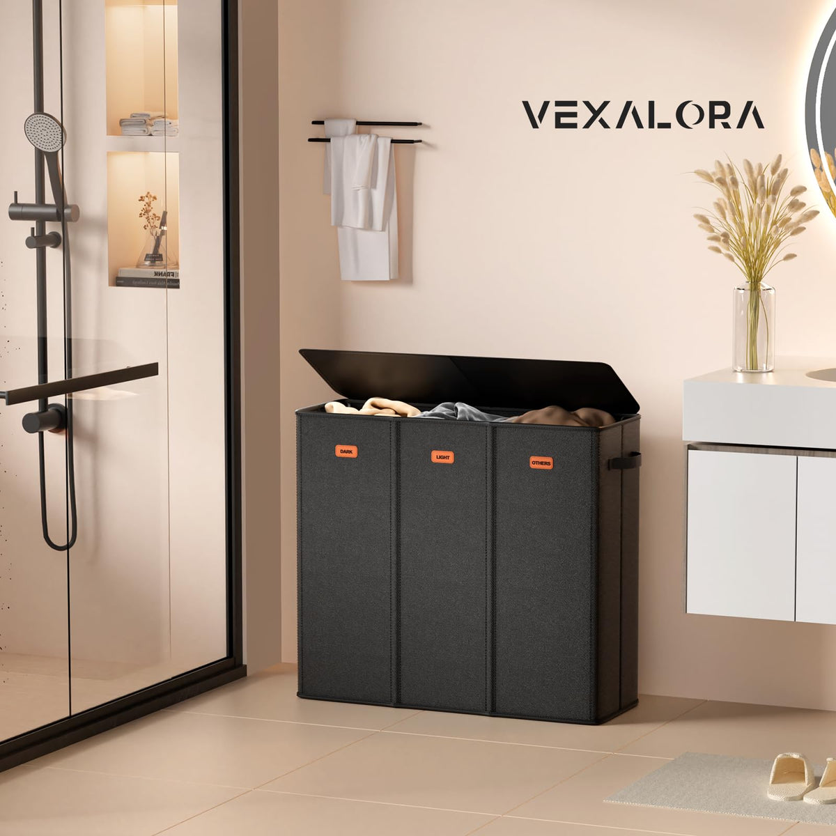 Vexalora lid blocks odors and keeps laundry concealed.