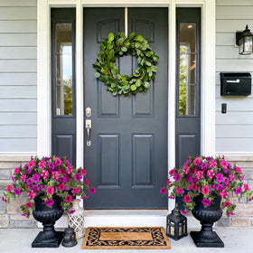 VGNQA artificial petunias on porch with window box arrangement