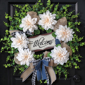 VIERENA wreath on front door shows lush eucalyptus and dahlias for curb appeal.