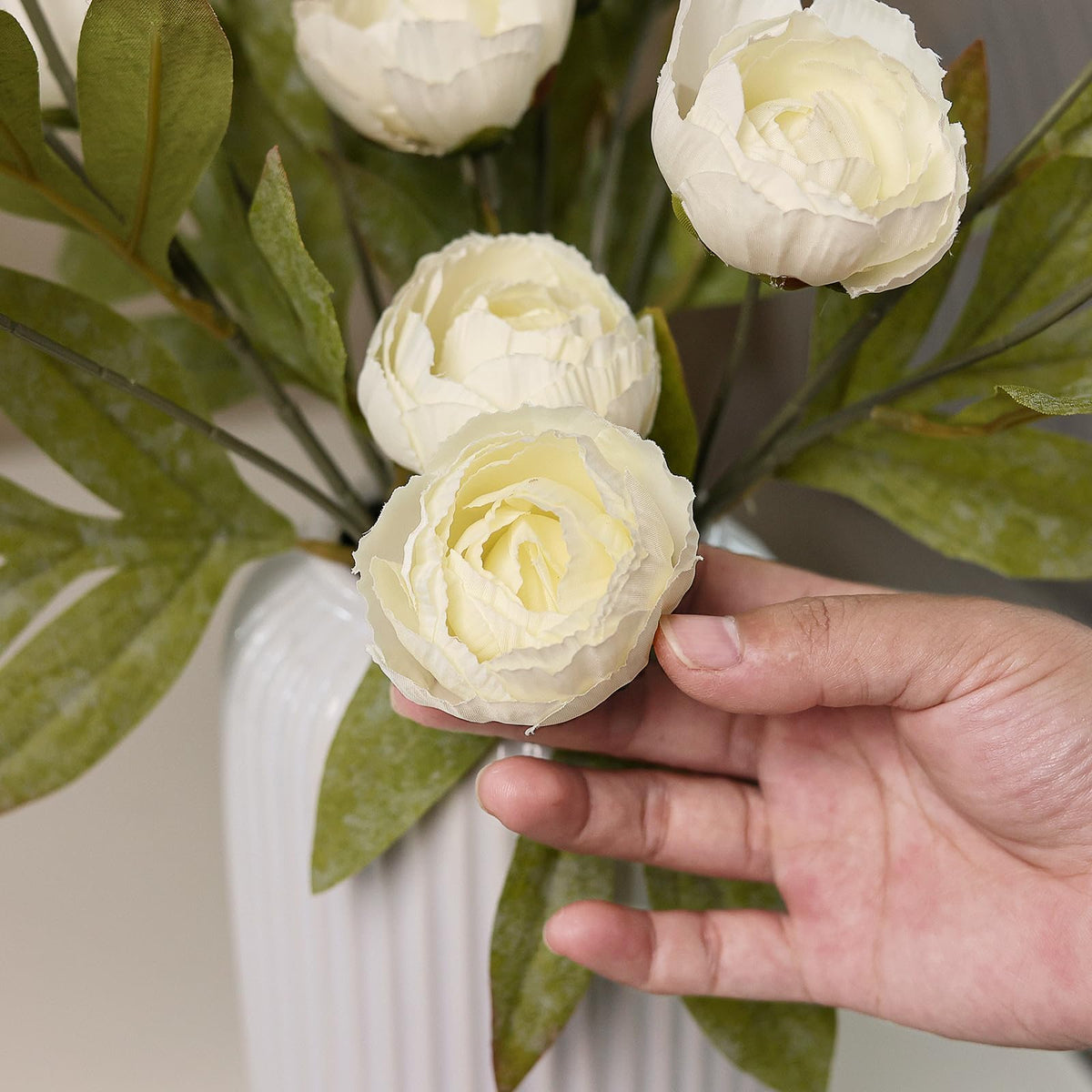 Vierena branch for table centerpiece enhances dining spaces.