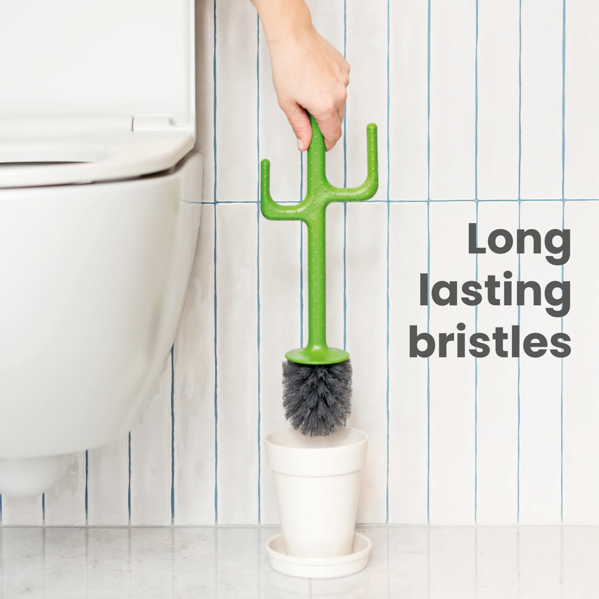 Vigar long non-slip handle aids reach and control during scrubbing.