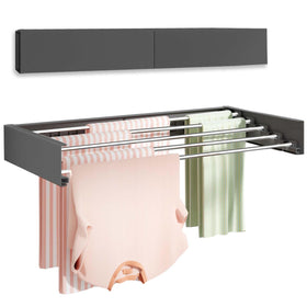 Vikaqi wall-mounted drying rack folded against the wall for space saving