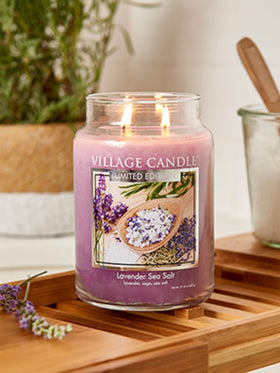 Village Candle label detail highlights premium ingredients and fragrance notes