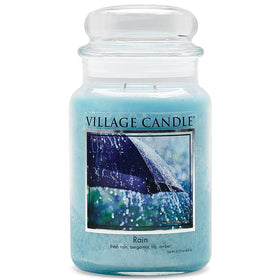 Village Candle Rain large glass apothecary jar showcases a bold blue color for long-lasting ambience.