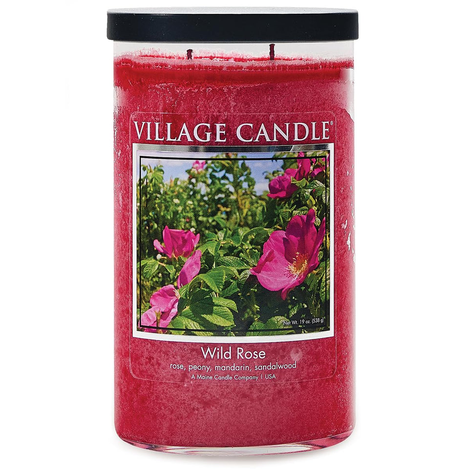 Village Candle Wild Rose tumbler in pink glow providing calming home ambiance