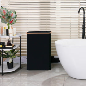 Vincona Slim Laundry Basket in black complements any room decor.