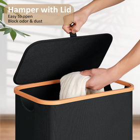 Vincona Slim Laundry Basket with easy-to-grip handles for comfortable transport.