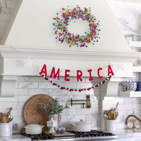 Hanging VioletEverGarden wreath on a door for easy setup