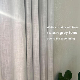Vision Home blackout-lined curtains block light and reduce heat.