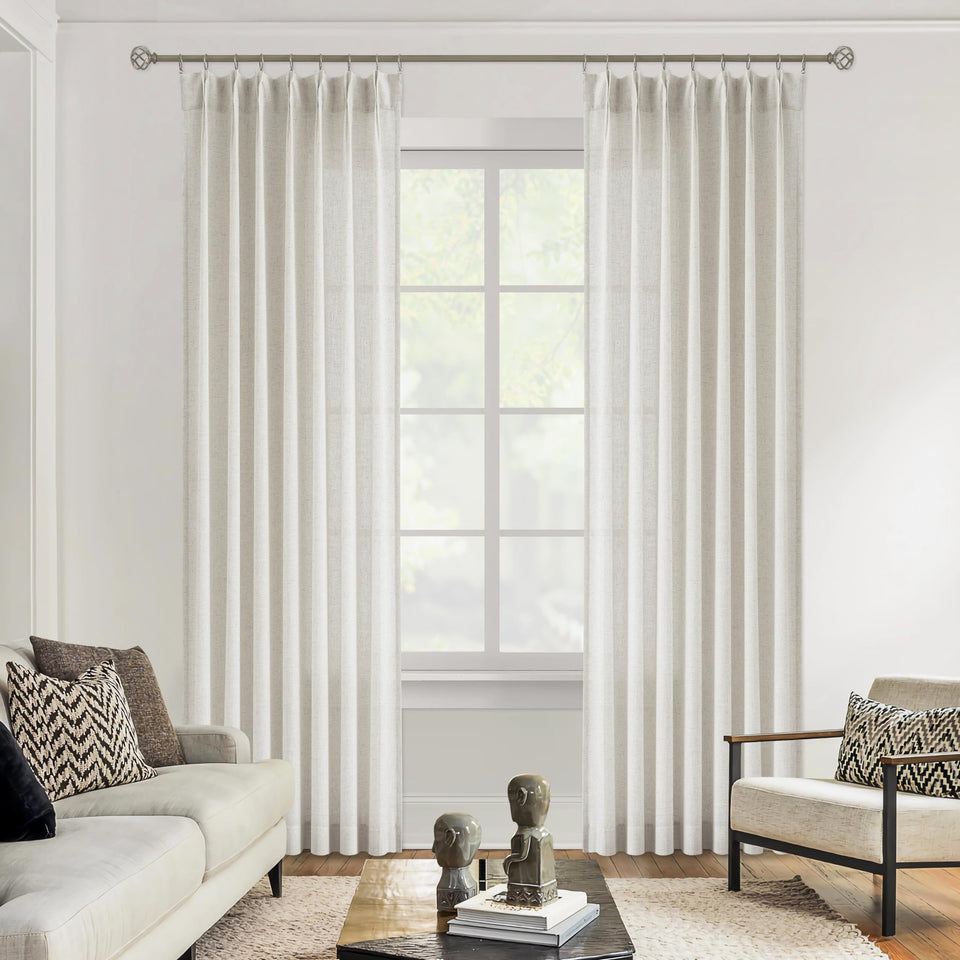 Vision Home pinch-pleated curtains provide refined privacy with two panels.