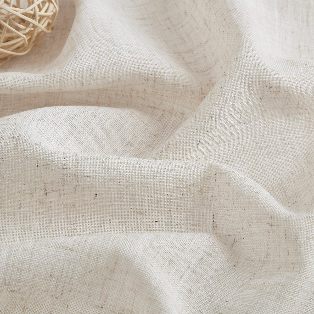 Vision Home pinch-pleated curtains drape smoothly over windows for versatile styling.